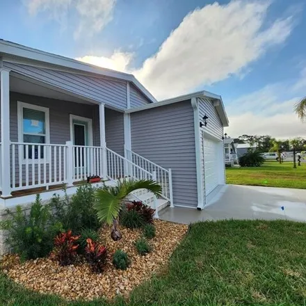 Buy this studio apartment on 5455 Fiddleleaf Drive in Lee County, FL 33905