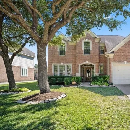 Buy this 4 bed house on 1350 Wealden Forest Drive in Gleannloch Farms, TX 77379