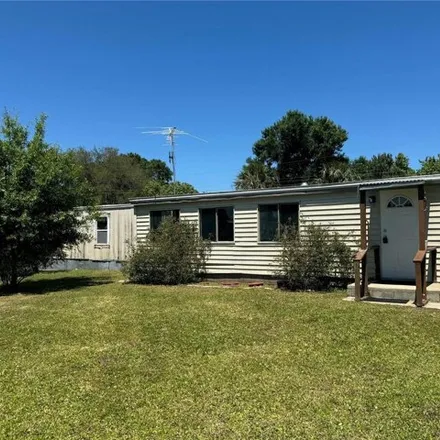 Buy this studio apartment on 148 North 1st Street in Oak Hill, Volusia County