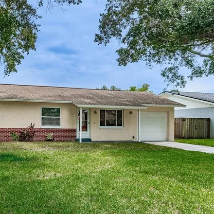 Buy this 4 bed house on 1608 Amberglen Drive in Palm Harbor, FL 34698