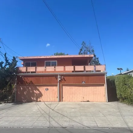 Rent this 3 bed apartment on 3805 Maybelle Avenue in Oakland, CA 94615