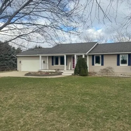 Buy this 4 bed house on South Green Avenue in Sheridan Township, MI 49412