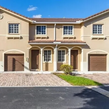 Buy this 4 bed townhouse on 21137 Northwest 14th Place in Miami Gardens, FL 33169