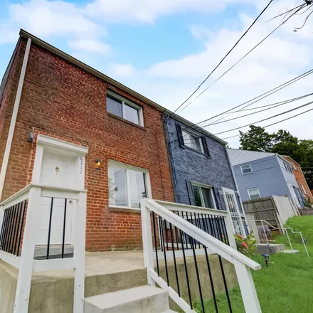 Buy this 3 bed townhouse on 6317 Longfellow Street in Rogers Heights, East Riverdale