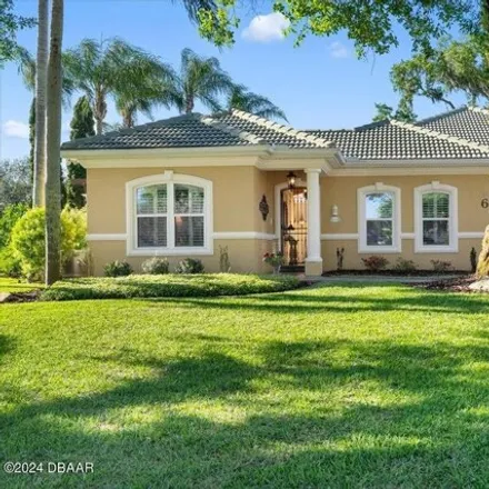Buy this 4 bed house on 6 Old Canyon Lane in Ormond Beach, FL 32174