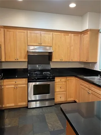 Rent this 4 bed townhouse on 1639 West 207th Street in Los Angeles, CA 90501