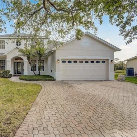 Buy this 5 bed house on 1600 Copperleaf Cove in Oviedo, FL 32766