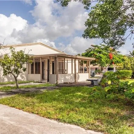 Rent this 4 bed house on 3821 Northwest 213th Street in Lakewood Estates, Miami Gardens