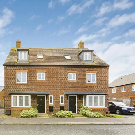 Buy this 4 bed townhouse on Nash Road in Heyford Park, OX25 5BL