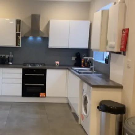 Rent this 8 bed townhouse on 13 Edenhall Avenue in Manchester, M19 2BG