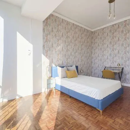 Rent this 7 bed apartment on Avenida Defensores de Chaves 83 in 1000-120 Lisbon, Portugal