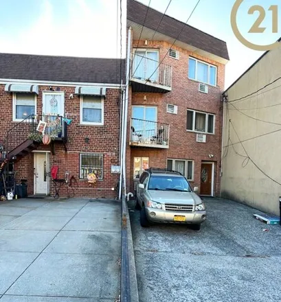 Buy this 6 bed house on 54-02 Metropolitan Avenue in New York, NY 11385