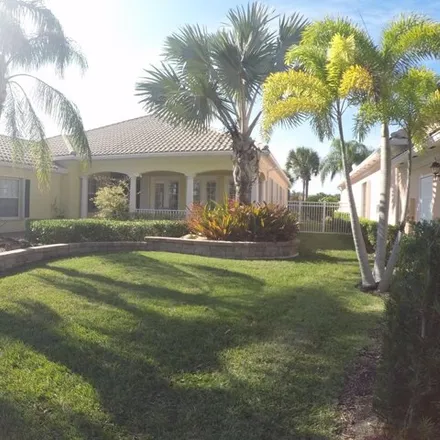 Buy this 4 bed house on 10898 Southwest Blue Mesa Way in Port Saint Lucie, FL 34987
