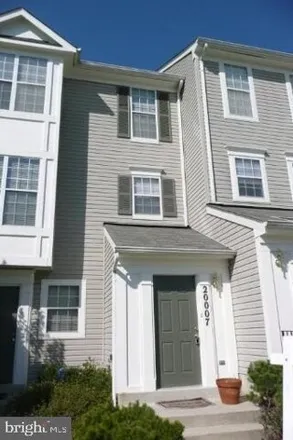 Rent this 3 bed townhouse on 20047 Gateshead Circle in Montgomery Village, MD 20876