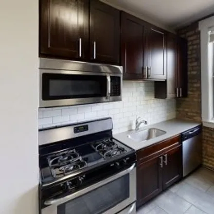 Rent this 3 bed apartment on #2,3418 North Elaine Place in Lake View East, Chicago