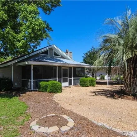 Rent this 3 bed house on 699 Wilson Circle in Mallory Park, Saint Simons