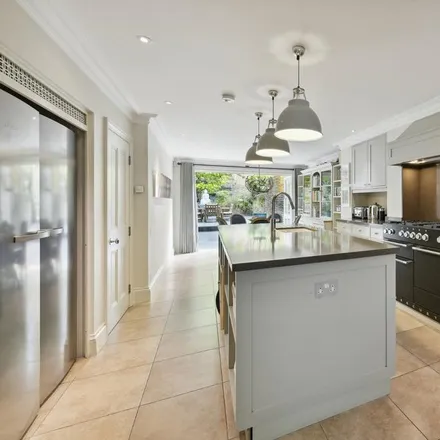 Rent this 4 bed townhouse on 38 Walham Grove in London, SW6 1QP