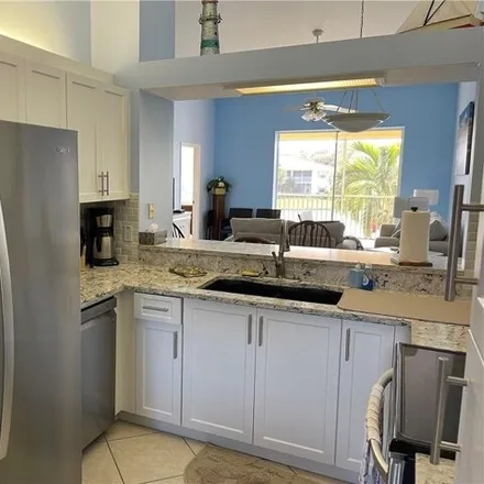 Rent this 2 bed condo on 380 Robin Hood Circle in Collier County, FL 34104