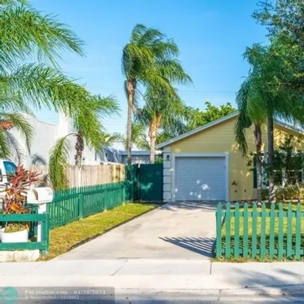 Rent this 3 bed house on 434 North H Street in Lake Worth Beach, FL 33460