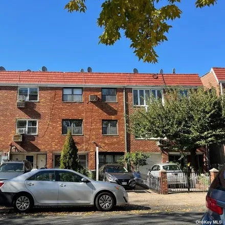 Buy this 5 bed townhouse on 24-24 79th Street in New York, NY 11370