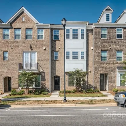 Buy this 4 bed townhouse on 11637 Red Rust Lane in Providence, Charlotte