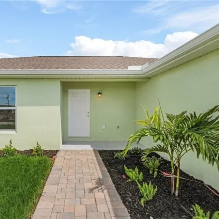 Rent this 4 bed house on 1209 Northeast 4th Place in Cape Coral, FL 33909