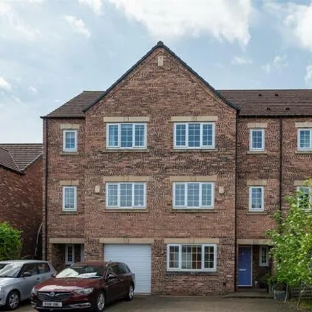 Buy this 4 bed townhouse on 20 Academy Drive in York, YO24 1UJ