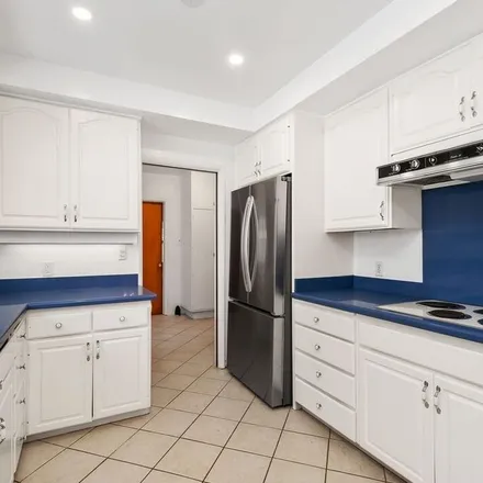 Rent this 4 bed apartment on 1350 Brinkley Avenue in Los Angeles, CA 90049
