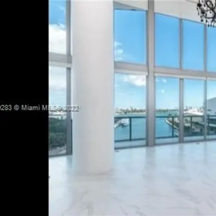 Rent this 2 bed apartment on 7-Eleven in 1 West Flagler Street, Miami