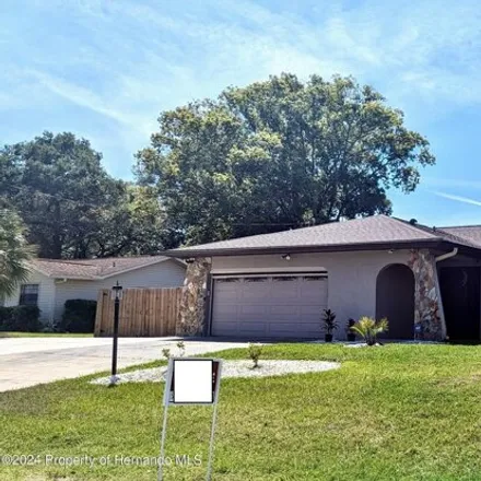 Buy this 3 bed house on 9034 Blackstone Street in Spring Hill, FL 34608