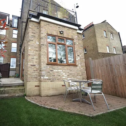 Rent this 2 bed townhouse on 32 Mazenod Avenue in London, NW6 4LY