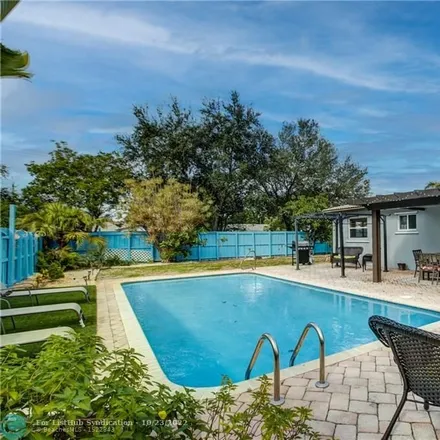 Buy this 3 bed house on 4461 Northeast 13th Terrace in Coral Heights, Broward County