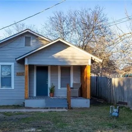 Rent this 2 bed house on 1352 East 23rd Street in Bryan, TX 77803