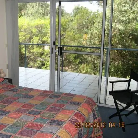 Rent this 3 bed townhouse on Broulee NSW 2537