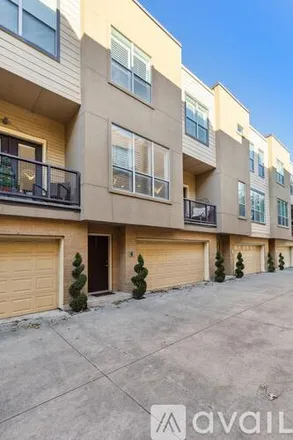 Rent this 2 bed townhouse on 4050 Mc Kinney Ave