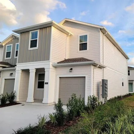 Rent this 3 bed townhouse on Stone Creek Trail in Osceola County, FL 34747