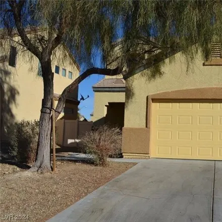 Rent this 4 bed house on 6548 Velvet Silk Street in North Las Vegas, NV 89084