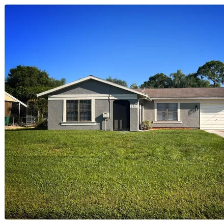 Rent this 3 bed house on 271 Northwest Archer Avenue in Port Saint Lucie, FL 34983