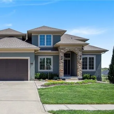 Buy this 5 bed house on 1223 Kingsland Circle in Raymore, MO 64083