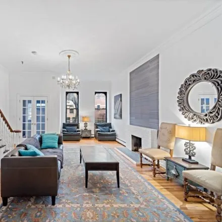 Buy this 4 bed townhouse on 105 Manhattan Avenue in New York, NY 10025