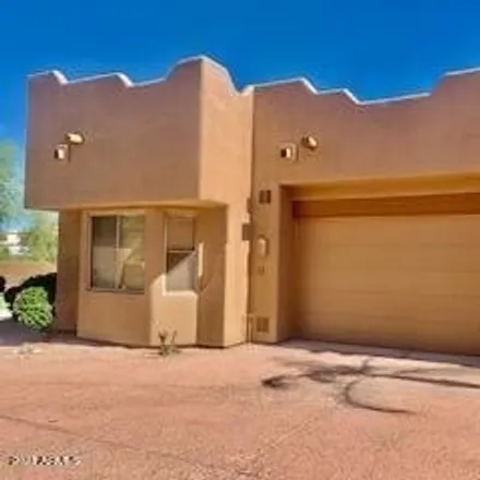Rent this 2 bed townhouse on 6460 East Trailridge Circle in Mesa, AZ 85215