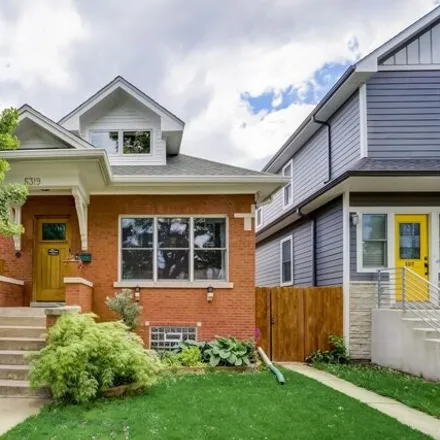 Buy this 4 bed house on 5319 North Ludlam Avenue in Chicago, IL 60630