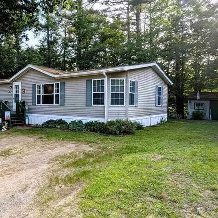 Buy this studio apartment on 120 Roberts Rd in Barrington, New Hampshire