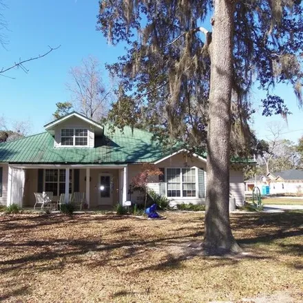 Buy this 3 bed house on 9284 Northwest 112 Lane in Levy County, FL 32626