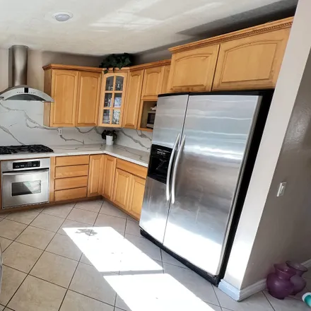 Rent this 4 bed house on 17391 Madera Lane in Huntington Beach, CA 92647