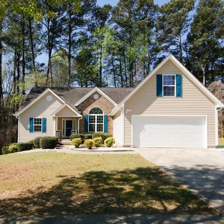 Rent this 2 bed apartment on 1574 Stephens Pond View Southwest in Gwinnett County, GA 30052