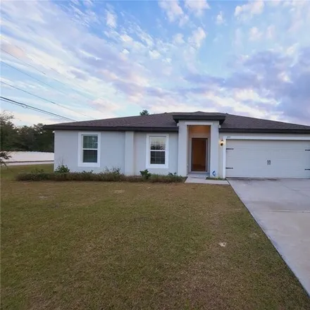 Buy this 3 bed house on 397 Begonia Court in Polk County, FL 34759
