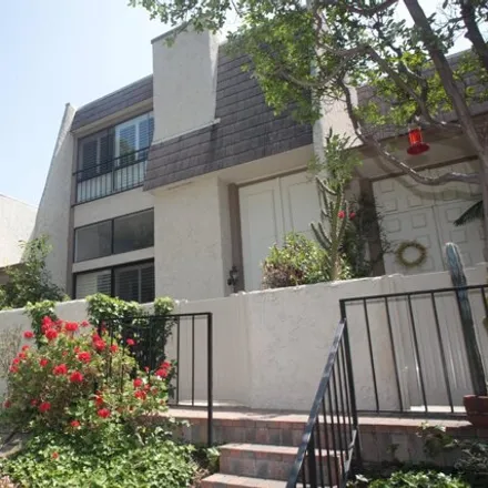 Rent this 3 bed townhouse on Shoup Avenue in Los Angeles, CA 91367