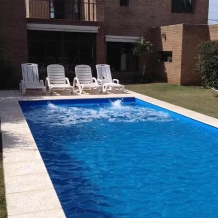 Buy this 4 bed house on unnamed road in Villa Rivera Indarte, Cordoba
