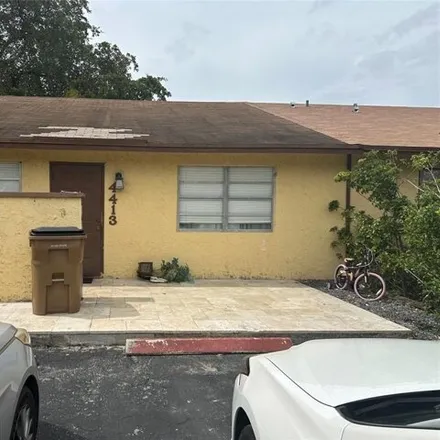 Rent this 2 bed house on 4469 Northwest 4th Avenue in Bonnie Lock, Deerfield Beach